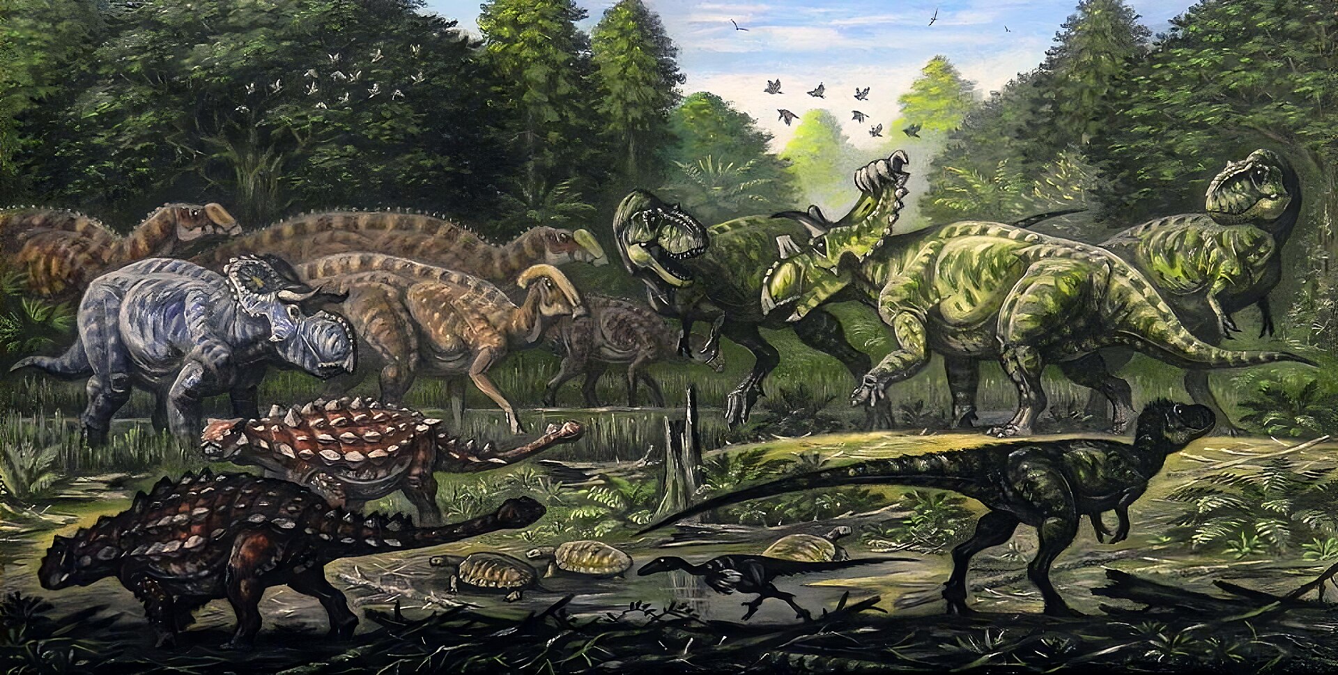 Idealizované zobrazení dinosauří megafauny jednoho z nejbohatších severoamerických souvrství – geologické formace Kaiparowits. Nachází se na jihu amerického státu Utah a stáří jeho vrstev činí zhruba 77 až 73 milionů let. Na obrázku jsou zobrazeny dr