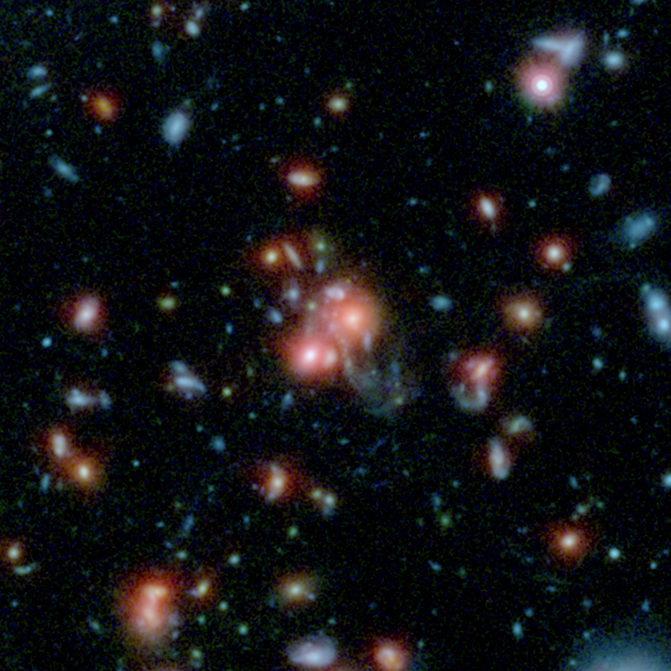 ObĹ™Ă­ galaktickĂ˝ klastr SpARCS1049+56 na kombinovanĂ©m snĂ­mku ve viditelnĂ©m svÄ›tle (HubbleĹŻv teleskop) a v infraÄŤervenĂ©m oboru (SpitzerĹŻv teleskop).  Kredit: NASA/STScI/ESA/JPL-Caltech/McGill