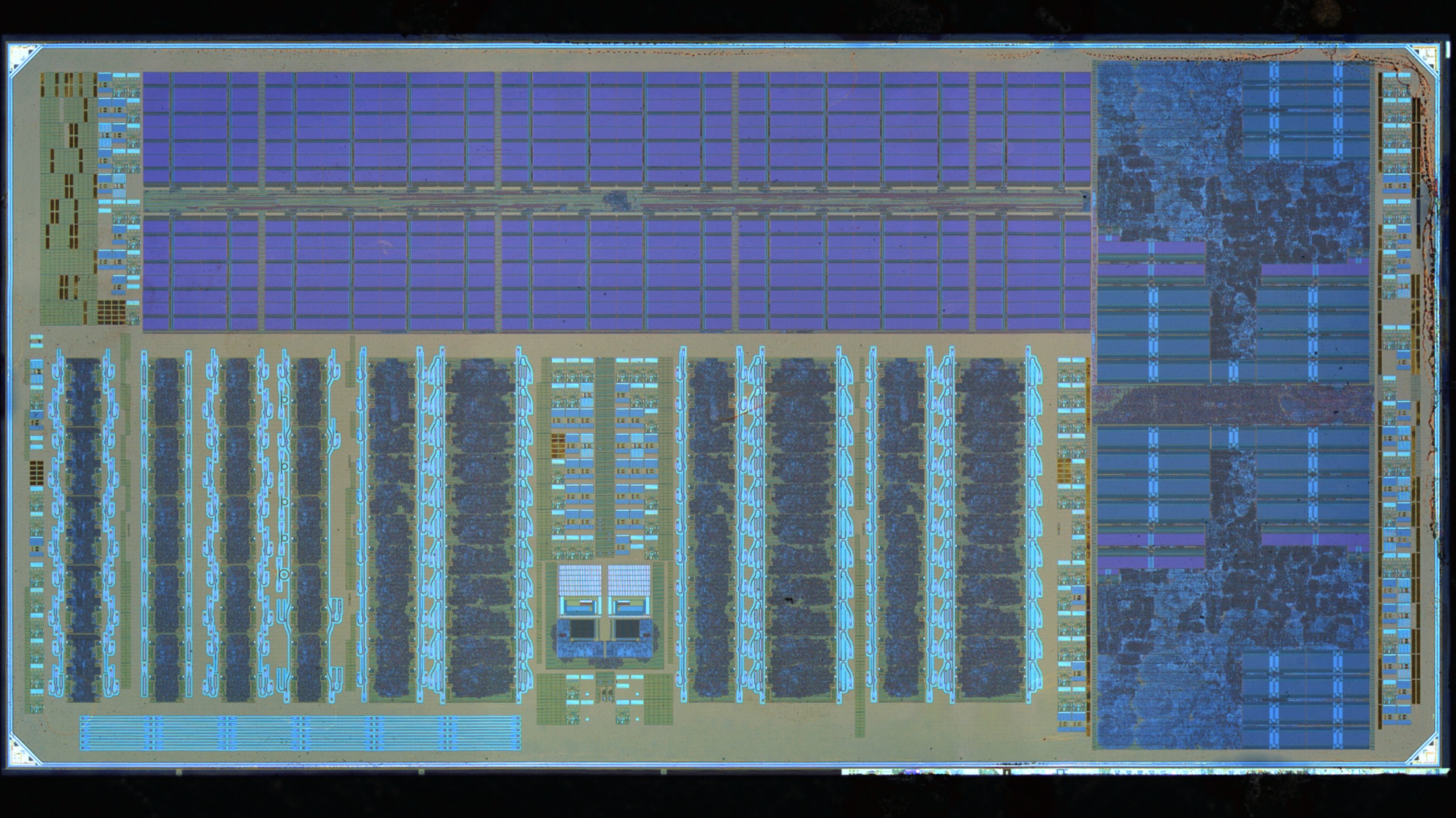 NovĂ˝ mikroÄŤip sÂ fotonikou pod mikroskopem. Kredit: Chen Sun & Sangyoon Han / UC Berkeley Marvell Nanofabrication Laboratory.