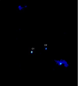 Snímek centra galaxie 0402+379, pořízený soustavou radioteleskopů VLBA. Kredit: Bansal et al., NRAO/AUI/NSF.