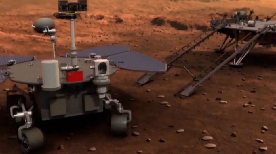 Umělecká představa vysazení vozítka mise Tchien-wen-1 na Marsu (CCTV/China National Space Administration).