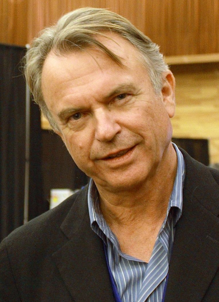 Jedním z herců v prvním Jurském parku, jehož jméno bylo zvěčněno v druhovém jméně čínského dinosaura, byl také Novozélanďan Sam Neill, který ztvárnil hlavní roli paleontologa Alana Granta. Zde na snímku z roku 2010. Kredit: sean.koo; Wikipedie (CC BY