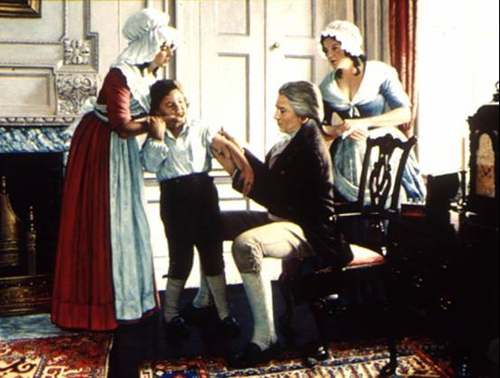 Edward Jenner očkuje dítě. Kredit: Orthopoxviridae / Wikimedia Commons.