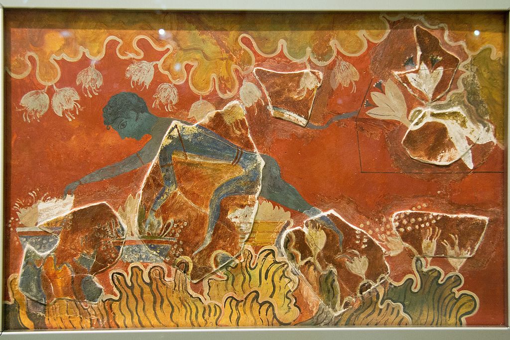 Mladík sbírá šafrán, středně velká freska z Knóssu, 1600-1450 před n. l. Je restaurovaná podle Evanse, který části modrého těla identifikoval jako chlapce. Vzadu nad ním je vidět ocas. Archeologické muzeum v Irakliu (Herakleion). Kredit: Zde, Wikimed