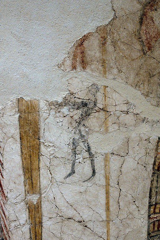 Maličká postava muže uprostřed hlavního panelu, možná nese obětní dary. Archeologické muzeum v Mykénách, MM 385. Kredit: Zde, Wikimedia Commons. Licence CC 4.0.