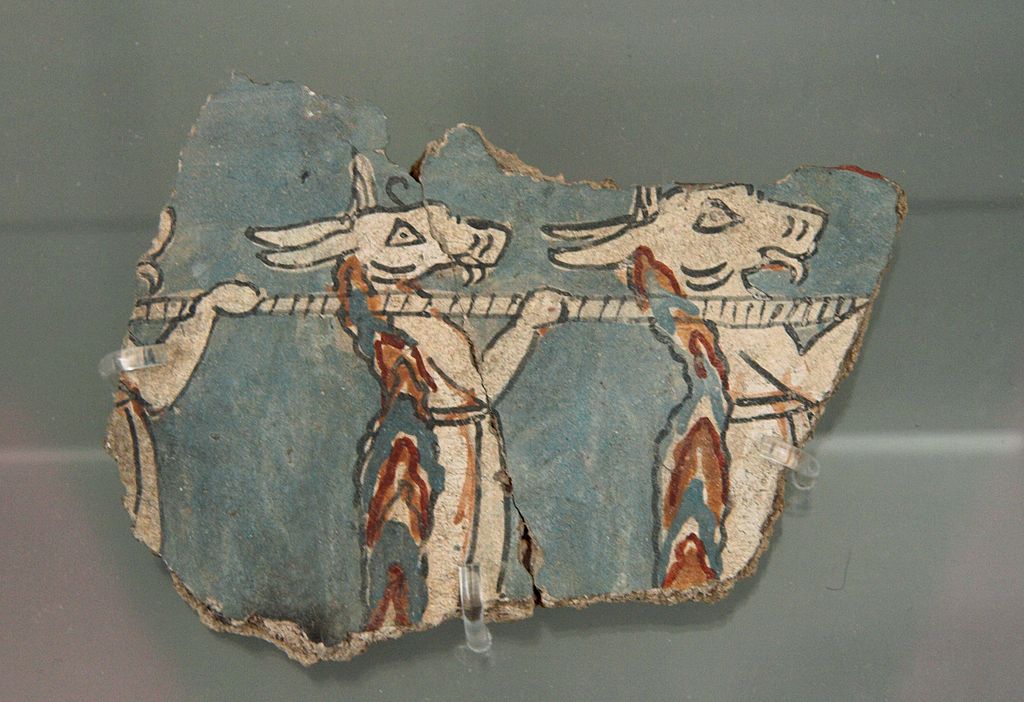 Kozlové jako nosiči, asi v obětním průvodu. Drobný fragment fresky z budovy „Na rampě“ v Mykénách, asi 13. století před n. l. nebo o málo starší. Národní archeologické muzeum v Athénách, 11670. Kredit: Zde, Wikimedia Commons. Licence CC 4.0.