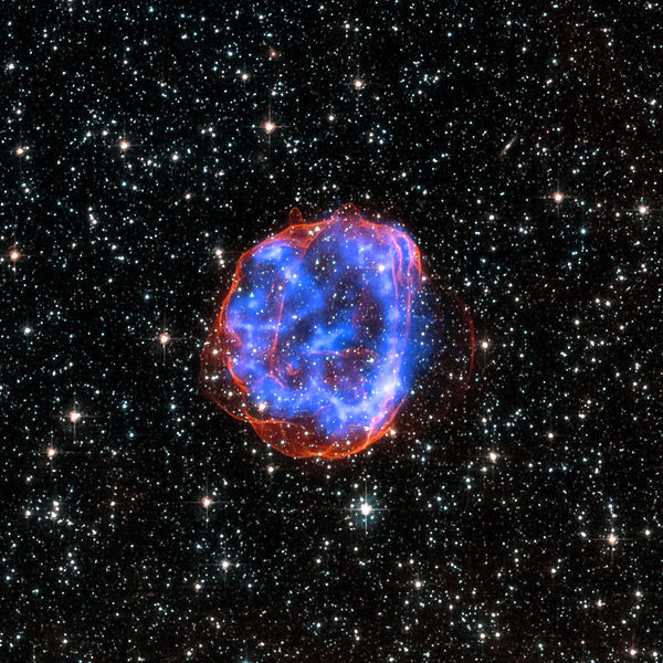 Pozůstatek klasické supernovy SNR E0519-69.0 v LMC. Kredit: X-ray: NASA/CXC/Rutgers/J.Hughes; Optical: NASA/STScI.
