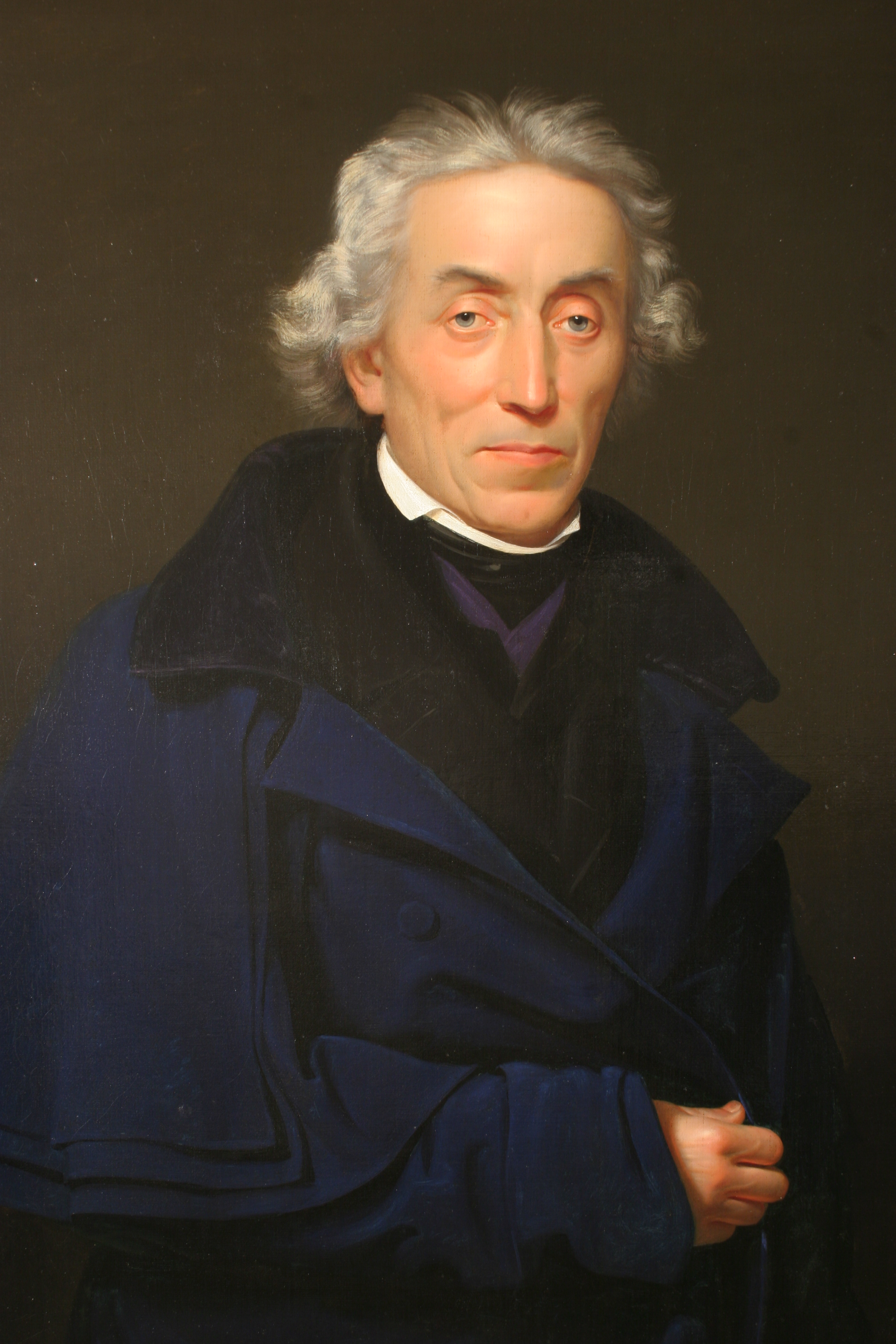Josef Dobrovský (1753  – 1829). Kněz, filolog, historik. Zakladatel vědecké bohemistiky a slavistiky, čímž  předznamenal a podnítil české národní obrození. K jeho největším zásluhám patří zavedení a soustavné uplatňování kritické metody ve vědeckém b