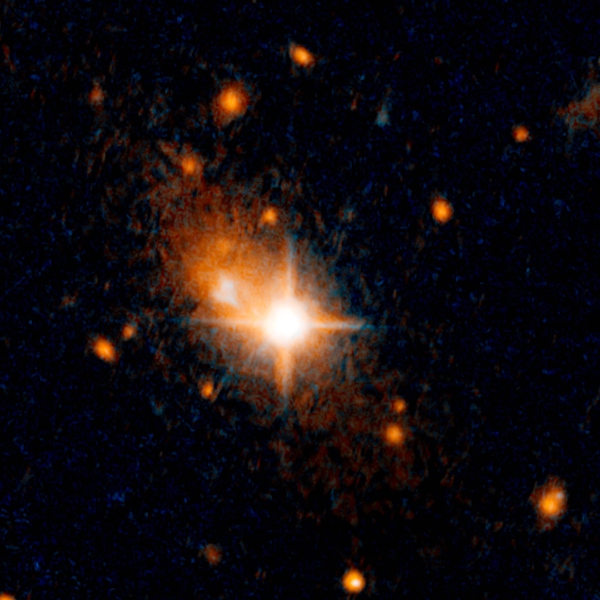 Uprchlá supermasivní černá díra. Kredit: NASA, ESA, and M. Chiaberge (STScI and JHU).