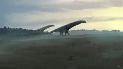 Ekologická scenérie s dvojicí procházejících patagotitanů, gigantických sauropodních dinosaurů z přelomu rané a pozdní křídy na území argentinské Patagonie (v pozadí). Dokonce i tito desítky tun těžcí giganti neměli svůj genom výrazně větší než bezmála milionkrát méně hmotní současní ptáci. Kredit: PaleoEquii; Wikipedie (CC BY-SA 4.0)