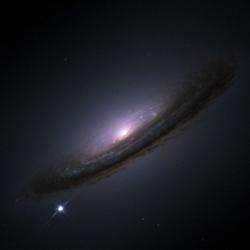 Pokud by na vině nárůstu radioaktivního izotopu uhlíku byla supernova (jasná skvrna vlevo dole), projevilo by se to nárůstem izotopů berylia a chloru (10Be a 36Cl) v ledových jádrech. Kredit: NASA / ESA, projektový tým Hubble Key.. CC BY 3.0