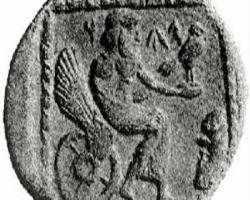 Jahve sedící na okřídleném kolečkovém křesle. Stříbrná drachma, 4. století před Kristem. (Foto: Arthur B. Cook, Kredit: Eickenberg at en.wikipedia)