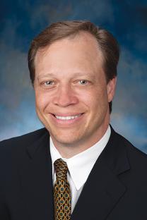 Robert M. Friedlander, vedoucí kolektivu. University of Pittsburgh School of Medicine.