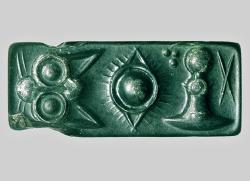 Krétské hieroglyfy na pečetním razítku z jaspisu, asi 1800 před n. l. Archeologické muzeum v Irakliu (Herakleonu). Kredit: Zde, Wikimedia Commons. Public domain.