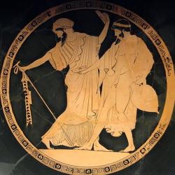 Komasté na cestě domů. Tondo (vnitřní dno) atického červeno-figurového kylixu (picí misky), 490 až 480 před n. l. München, Staatliche Antikensammlungen, 2647 (J793). Kredit: Bibi Saint-Pol, Wikimedia Commons. Public domain.