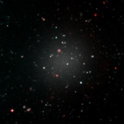 Galaxie NGC1052-DF2, temné hmoty prostá. Kredit: Gemini Observatory/NSF/AURA/Keck/Jen Miller.