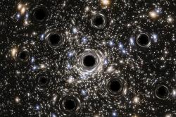 Umělecká představa malých černých děr. Zdroj: https://images.theconversation.com/