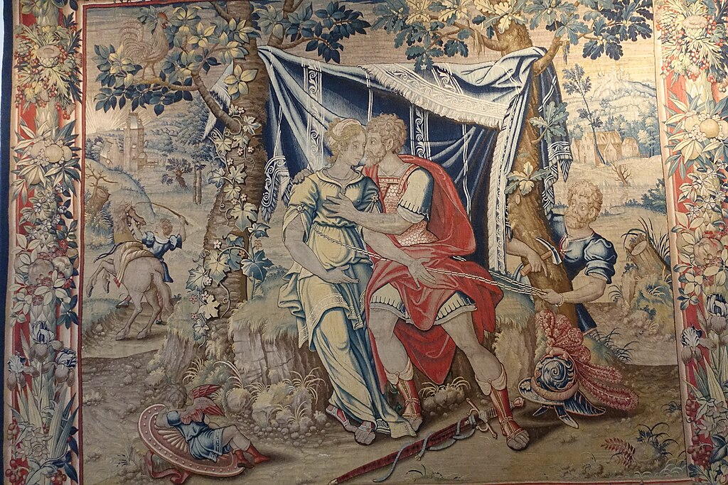 Héfaistos lapil Area s Afrodítou. Velká tapiserie vyrobená v Bruselu v letech 1525-1550. Muzeum Machado de Castro (Coimbra, Portugalsko). Kredit: Joseolgon, Wikimedia Commons. Licence CC 4.0.