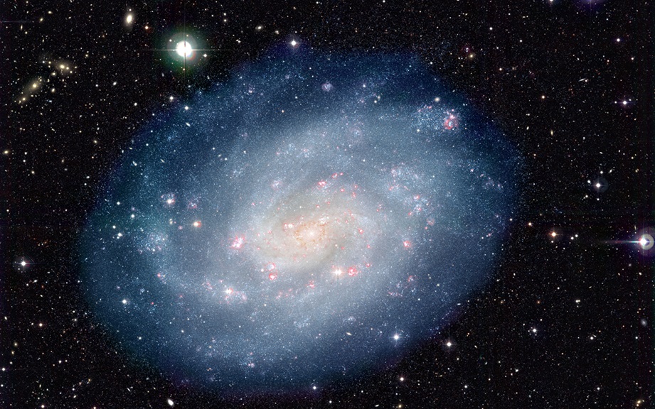Spirální galaxie NGC 300 na snímku Evropské jižní observatoře. Zdroj: https://cdn.eso.org/