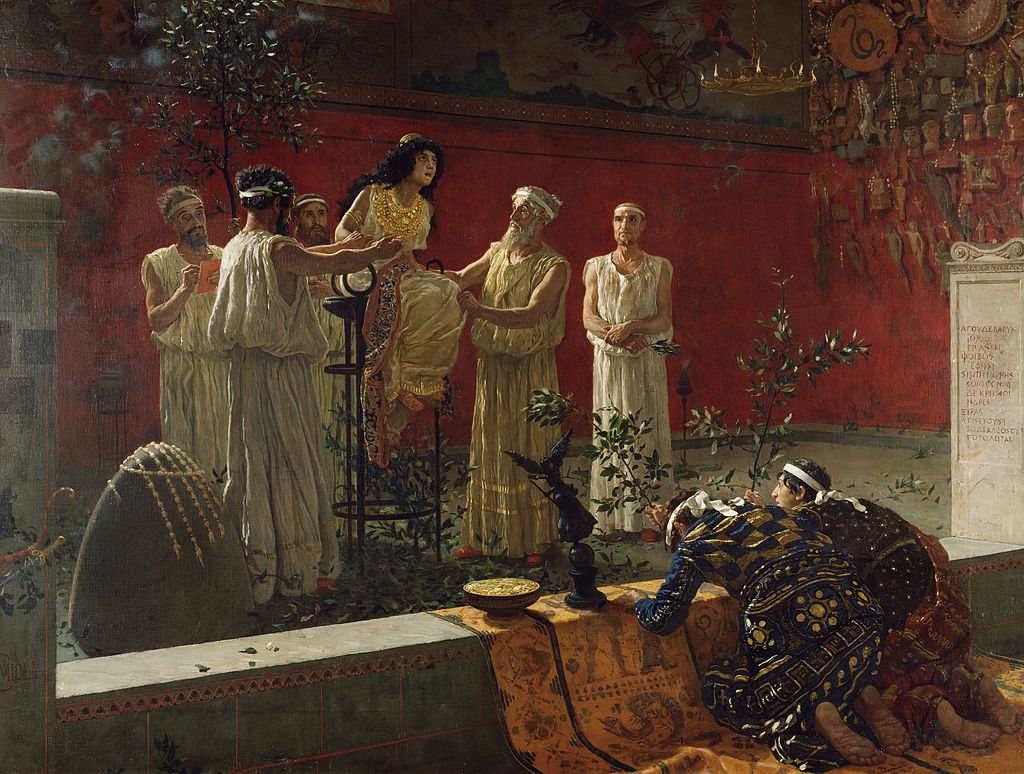 Camillo Miola (Biacca), Orákulum (The Oracle), 1880. Pythie na trojnožce obklopená kněžími a jejich pomocníky, vedle omfalos se smotky vlny, kolem vavřín. V tom se představa malíře 19. století celkem trefuje, v ostatním asi méně. Getty Center, Los An